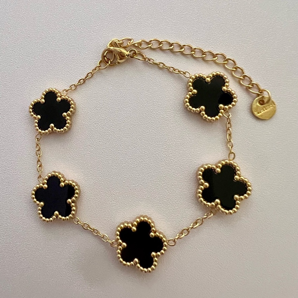 Elegant Gold and Black Flower Bracelet